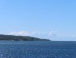 island, with the mainland mountains in the distance